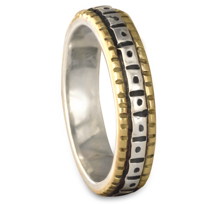 This mixed metal gold over silver two tone wedding ring is beautiful, affordable, and durable.